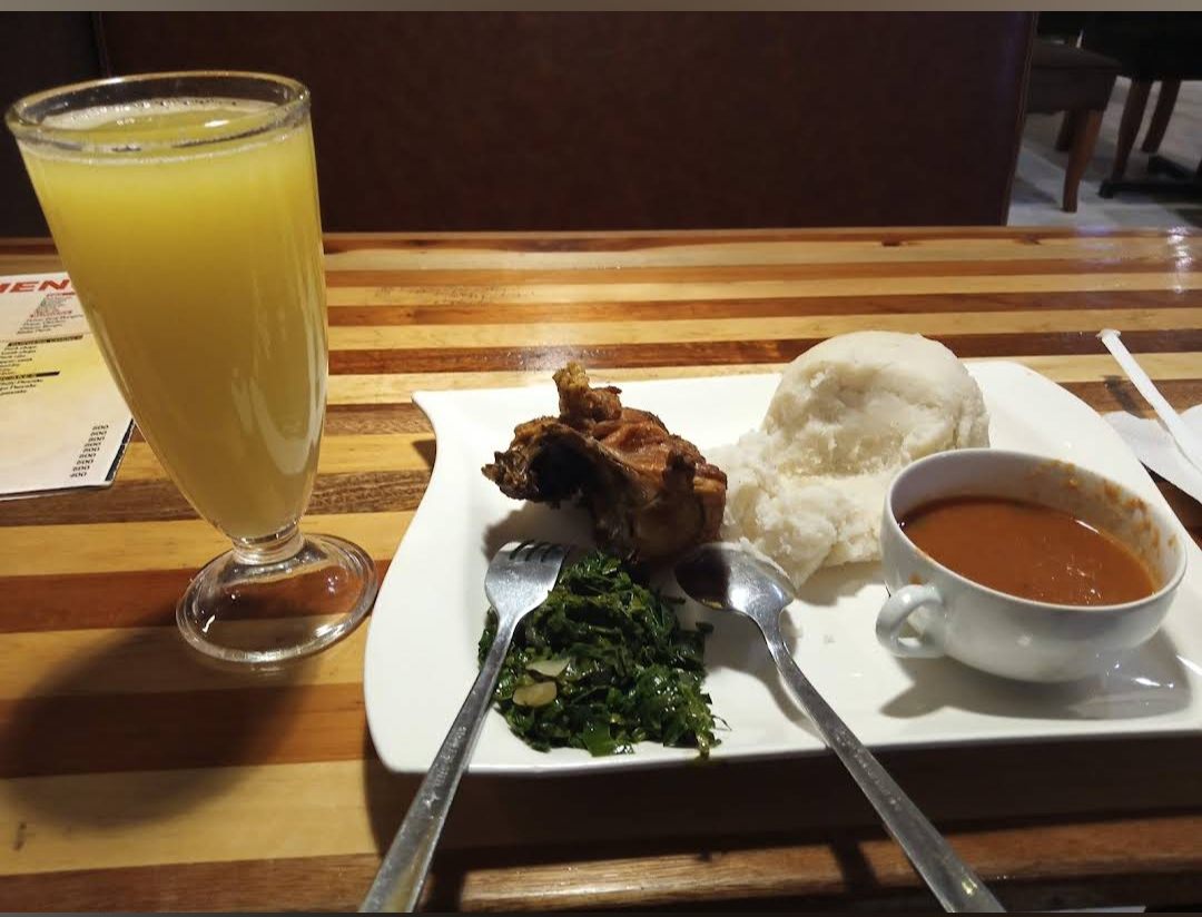 Ugali, chicken and greens
